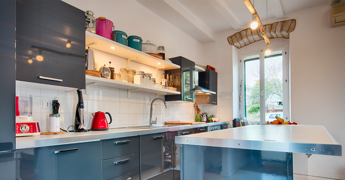 Kitchen painted in blue and white colour combination