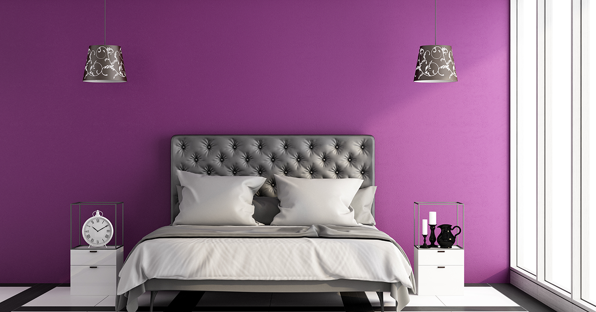 Bedroom wall painted in purple colour