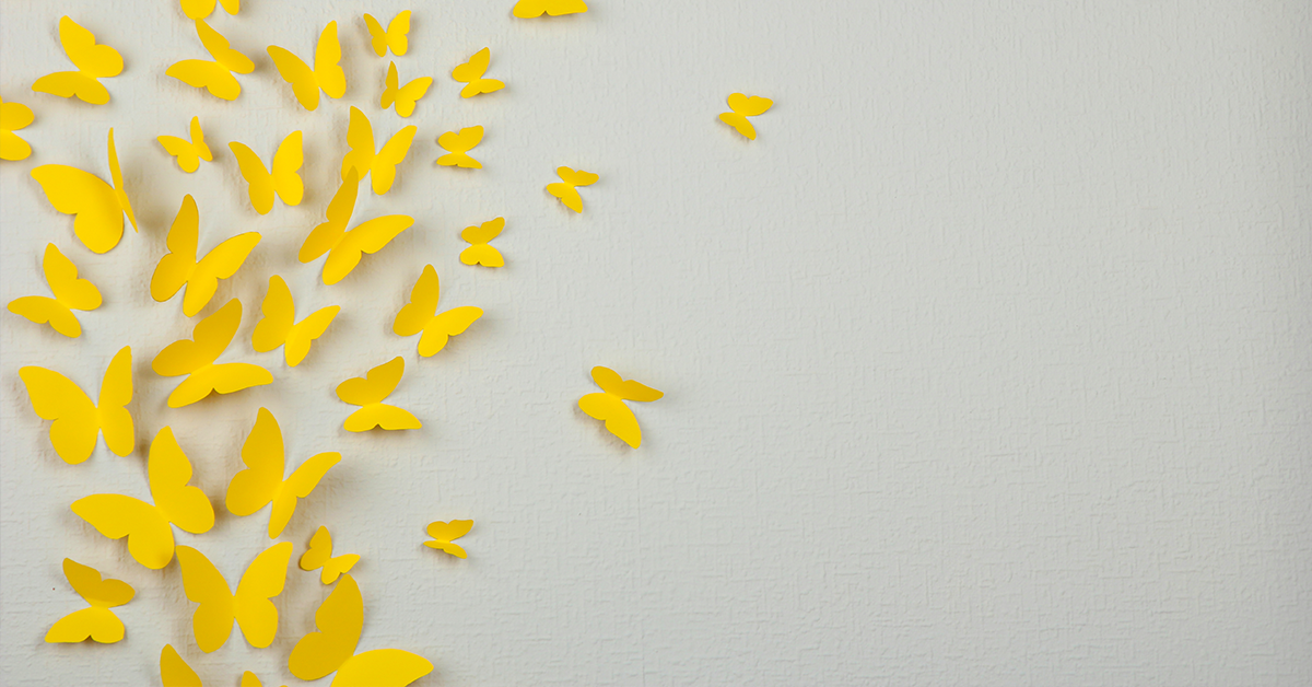 Yellow oigami on white walls