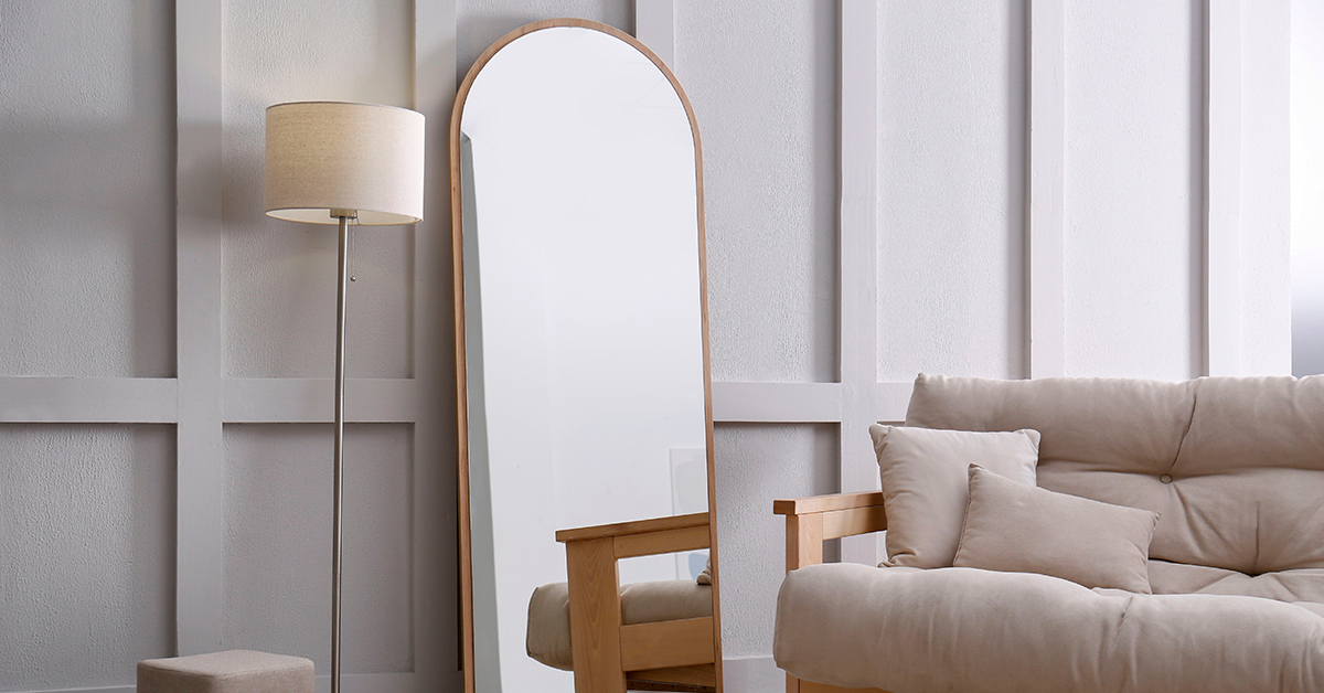 Unique arched mirror in living room