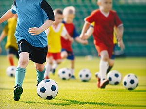 Kids playing football