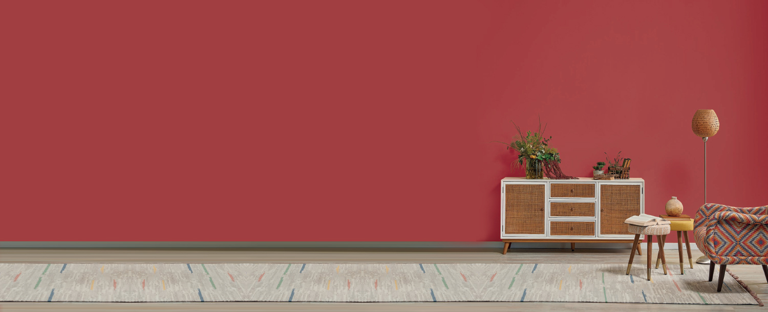 Dark Pink Wall And A Wooden Media Console